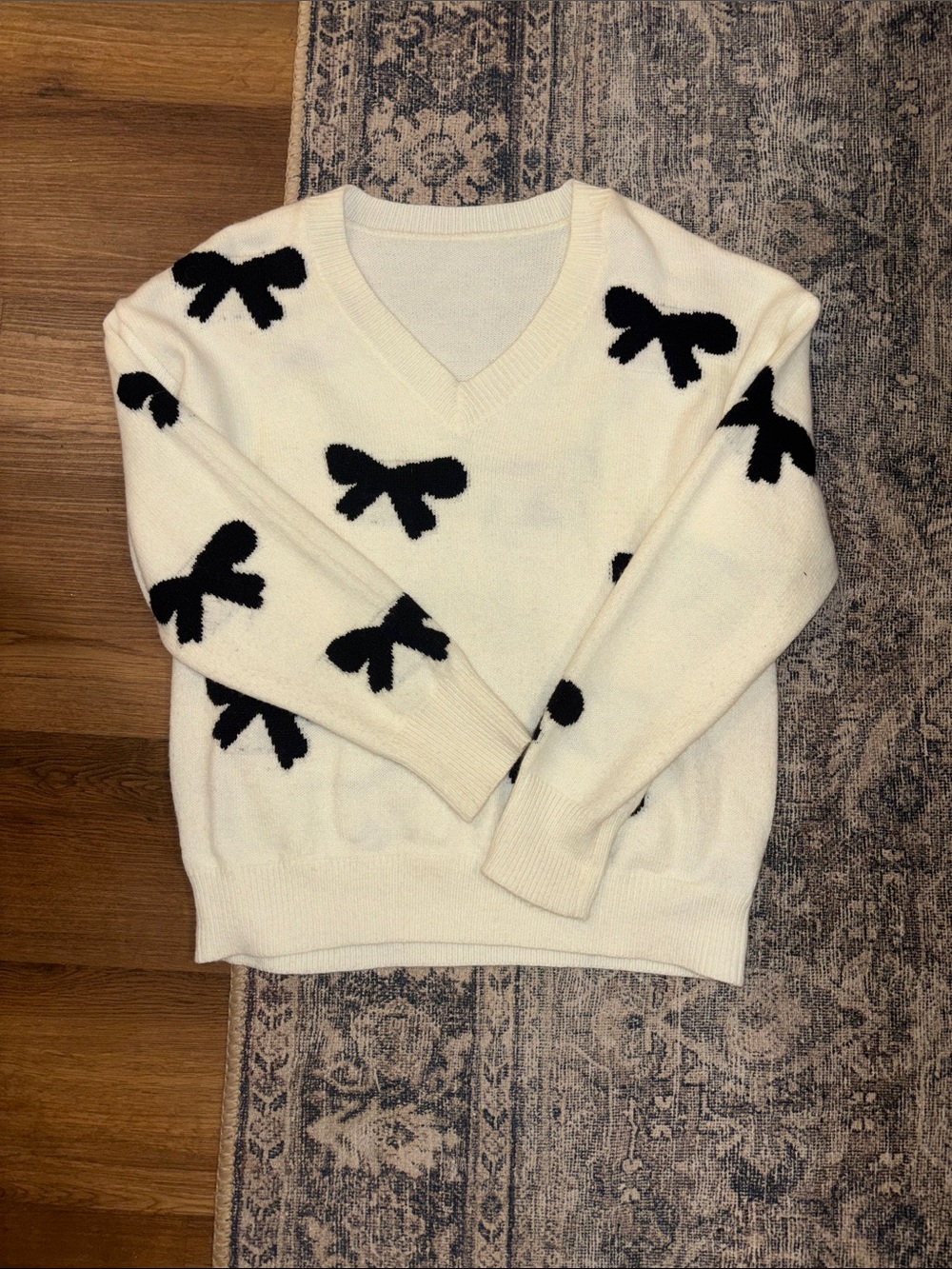 SHEIN Cream V-Neck Sweater with Black Bow Pattern